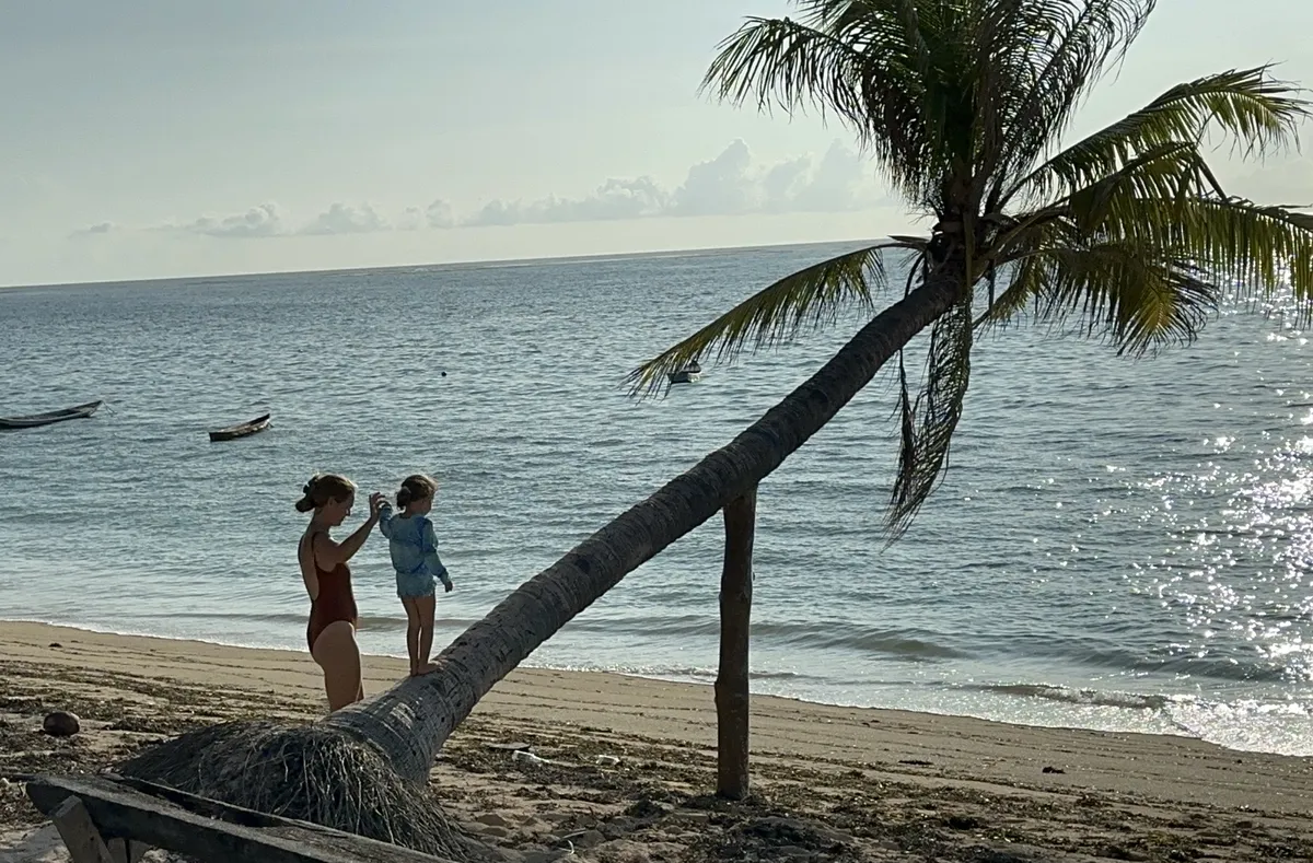 Maria and child at the beach