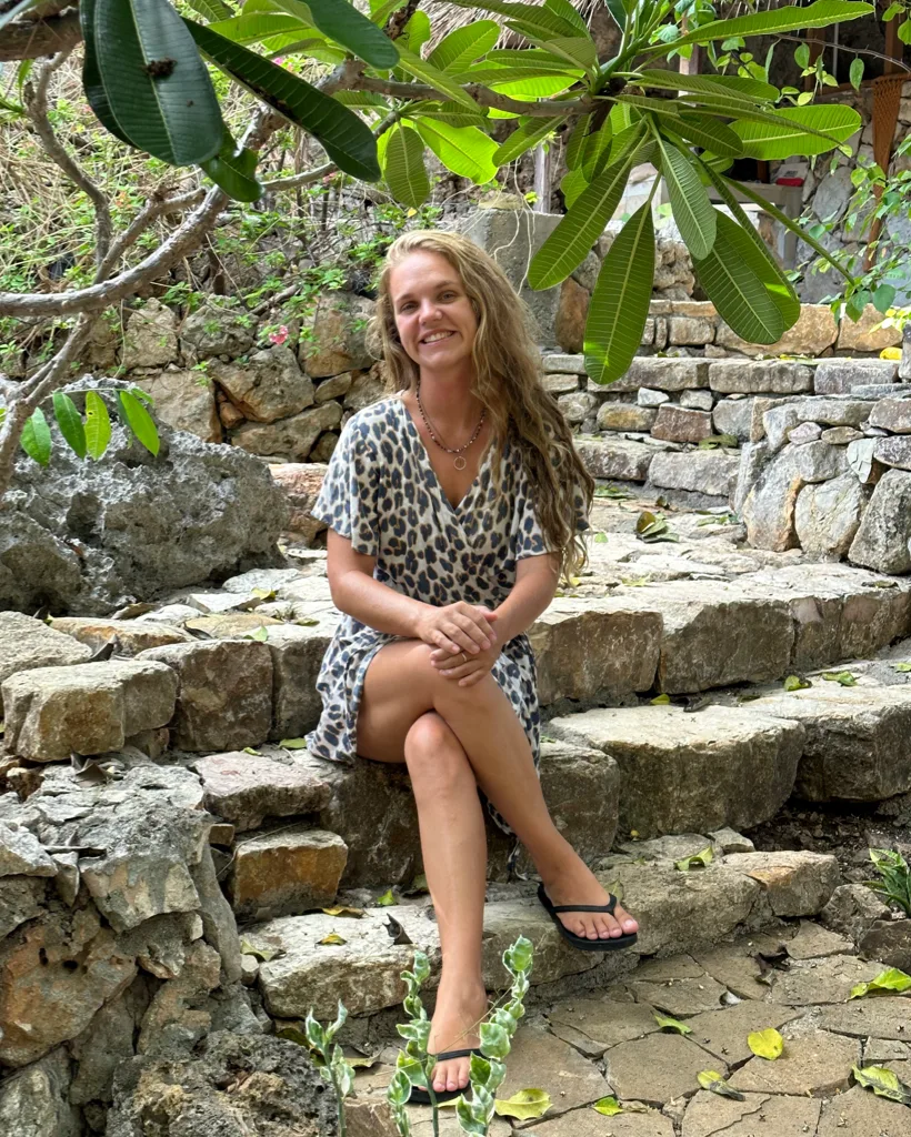 Maria Frisch seated outdoors in Bali